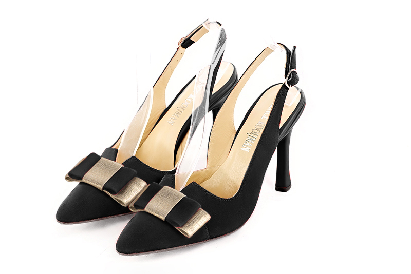 Matt black and gold women's open back shoes, with a knot. Tapered toe. Very high slim heel - Florence KOOIJMAN